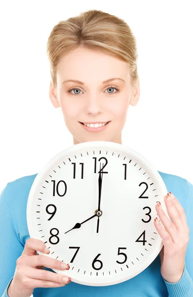 Woman holding big clock Stock Photo