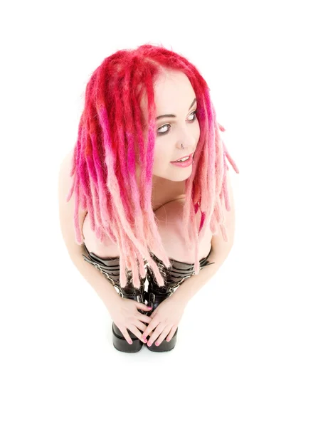 Menina de cabelo rosa em botas altas Fotos De Bancos De Imagens