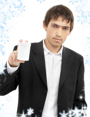 Confident man showing blank medication container clipart