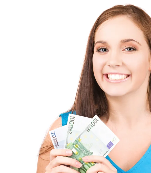 Krásné dospívající dívka s penězi — Stock fotografie