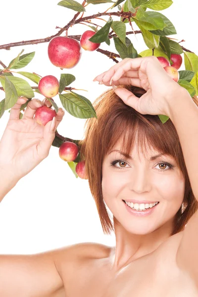 Mulher feliz com galho de maçã — Fotografia de Stock