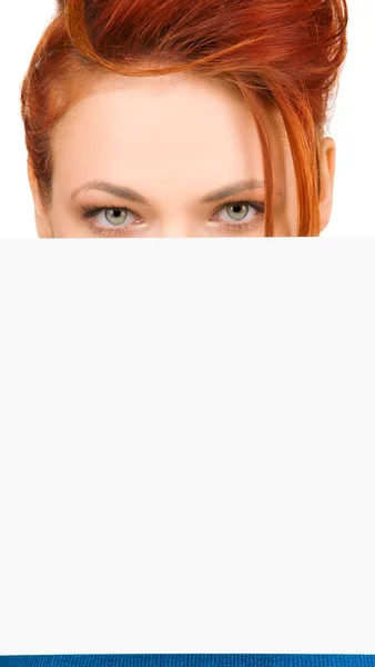 空白板的红头发女人 — 图库照片