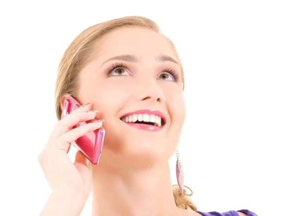Menina feliz com telefone rosa — Fotografia de Stock