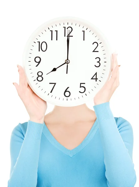 Woman with big clock covering face — Stock Photo, Image