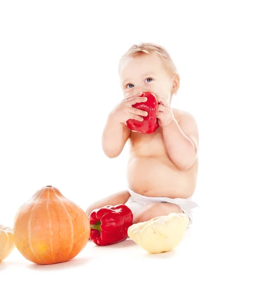 Baby boy with vegetables — Stock Photo, Image