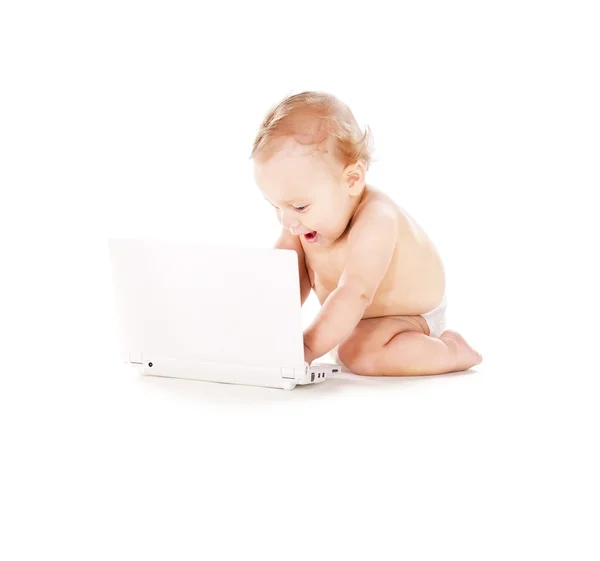 Baby boy with laptop computer — Stock Photo, Image