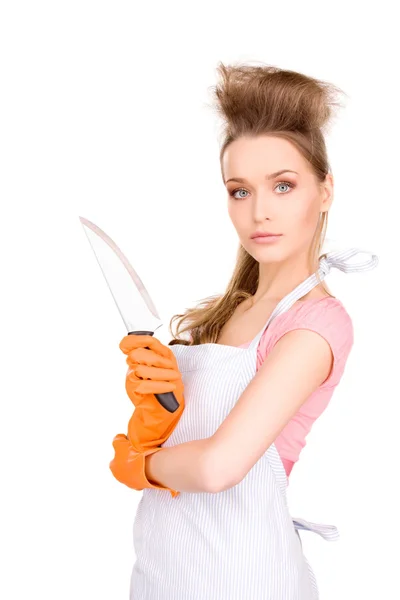Femme au foyer avec grand couteau — Photo