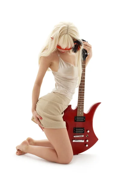 Girl in mask with red guitar — Stock Photo, Image