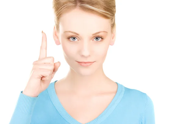Woman with her finger up — Stock Photo, Image