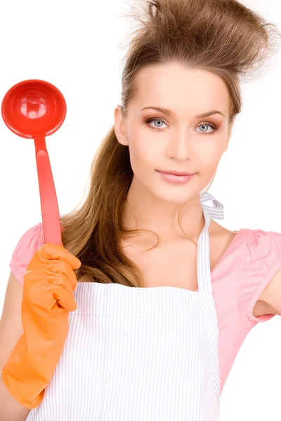 Housewife with red ladle — Stock Photo, Image