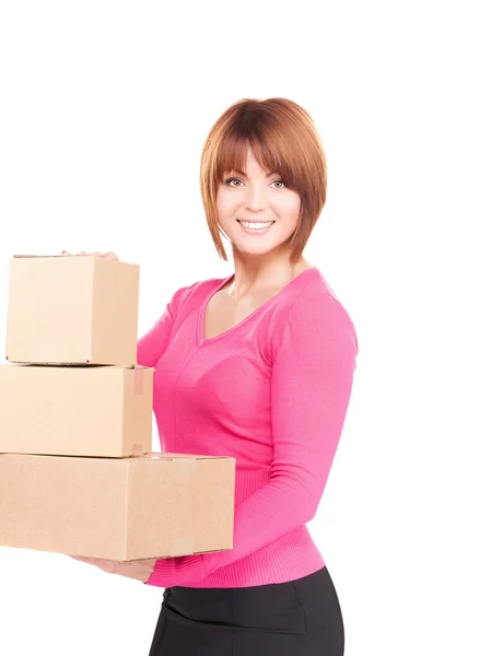 Geschäftsfrau mit Paketen — Stockfoto