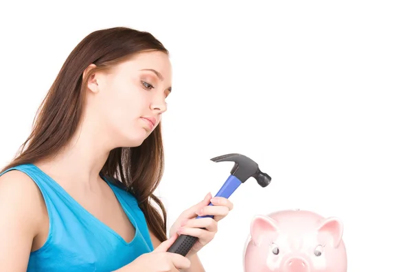 少女与猪存钱罐和锤子 — 图库照片