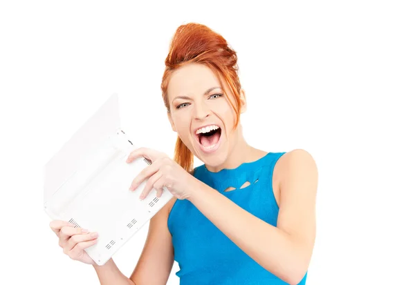 Angry woman with laptop computer — Stock Photo, Image