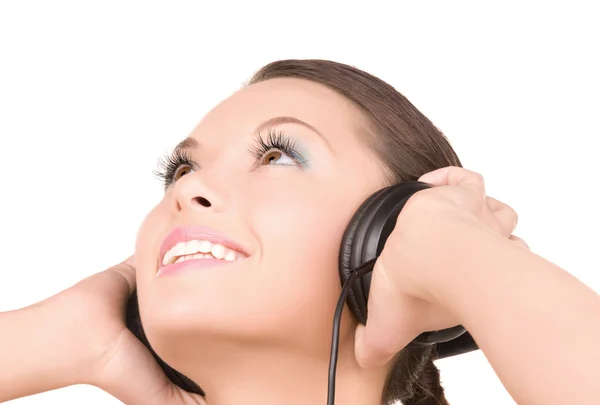 Šťastná žena v sluchátka — Stock fotografie