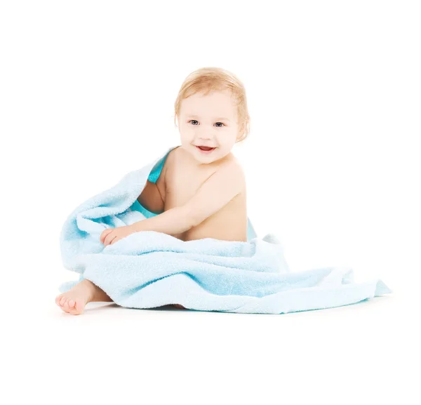 Baby with blue towel — Stock Photo, Image