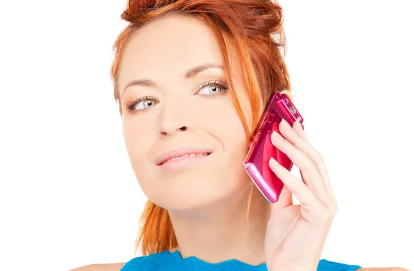 Mulher feliz com telefone rosa — Fotografia de Stock