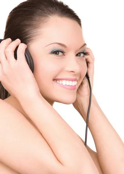 Ευτυχισμένη γυναίκα στα ακουστικά — Φωτογραφία Αρχείου