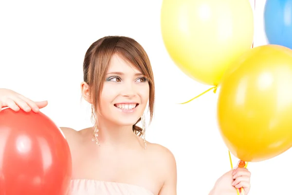 Gelukkig tienermeisje met ballonnen — Stockfoto