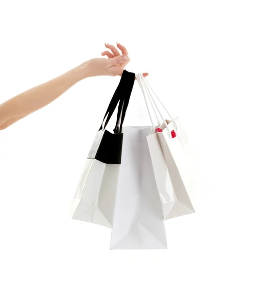 Mão com sacos de compras — Fotografia de Stock