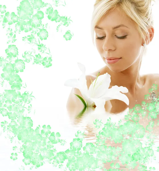 Lily blond in water with flowers — Stock Photo, Image