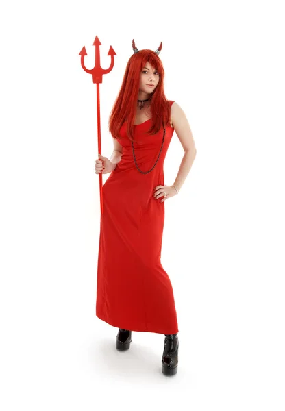 Röd djävul tjej i latex stövlar — Stockfoto