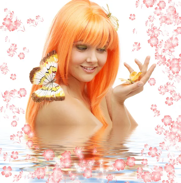 Butterfly girl with flowers in water — Stock Photo, Image