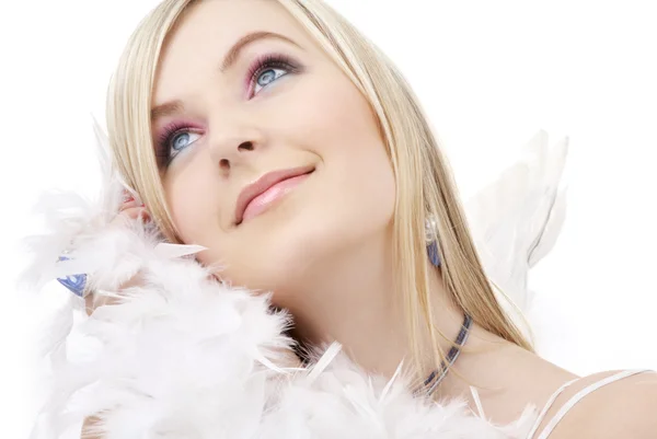 Gelukkig blond engel meisje met feather boa — Stockfoto