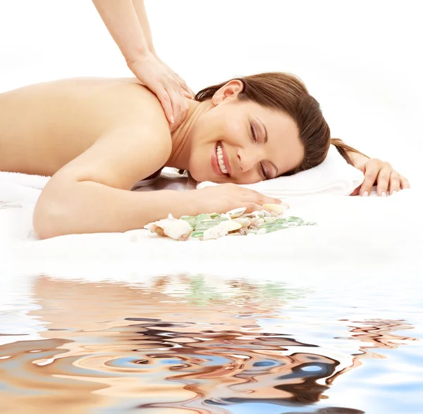 Picture of lovely lady taking massage on white sand — Stock Photo, Image