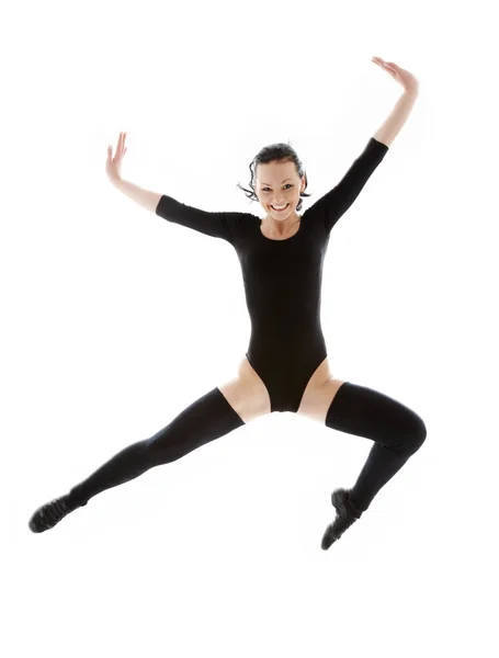 Jumping lány fekete balett-trikó — Stock Fotó