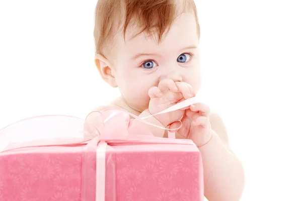 Baby boy with gift box — Stock Photo, Image
