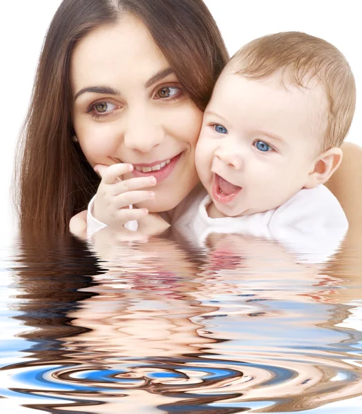 Bathing baby in mother hands — Stock Photo, Image