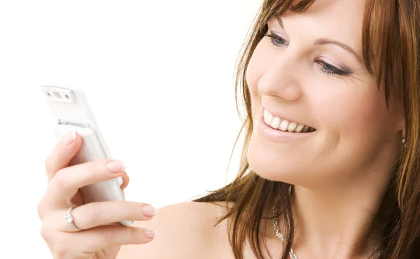 Mulher feliz com telefone branco — Fotografia de Stock