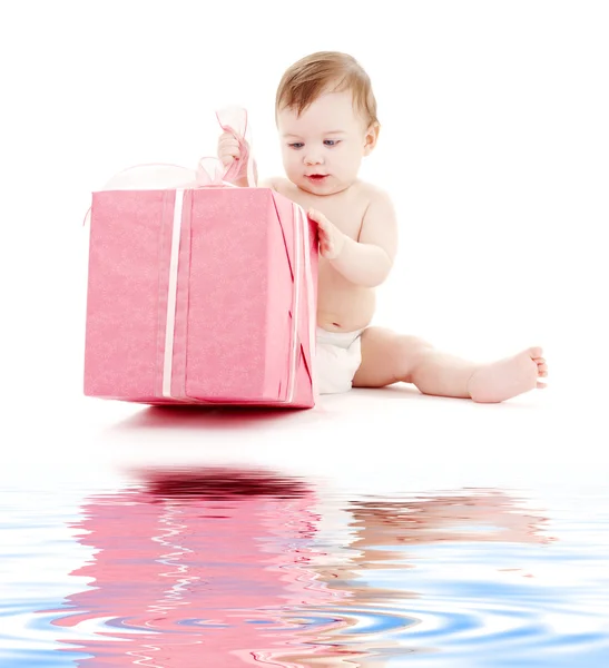 Baby boy in diaper with big gift box — Stock Photo, Image