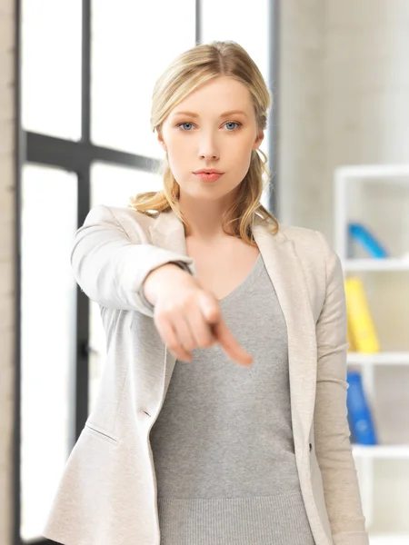 Businesswoman pointing her finger — Stock Photo, Image