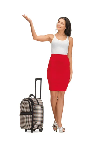Mujer feliz con maleta de saludo —  Fotos de Stock