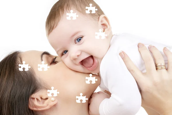 stock image Puzzle of laughing baby playing with mother