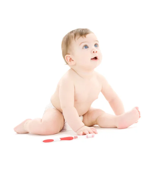 Bambino in pannolino con spazzolino da denti — Foto Stock