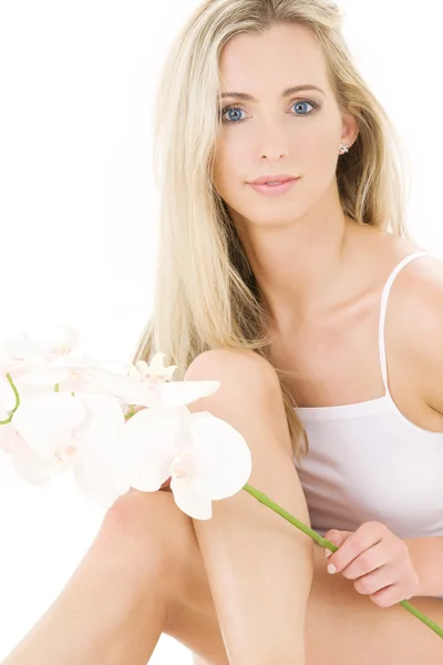 Blonde in cotton underwear with orchid — Stock Photo, Image