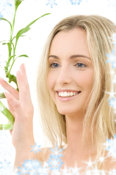 Happy blonde with bamboo — Stock Photo, Image