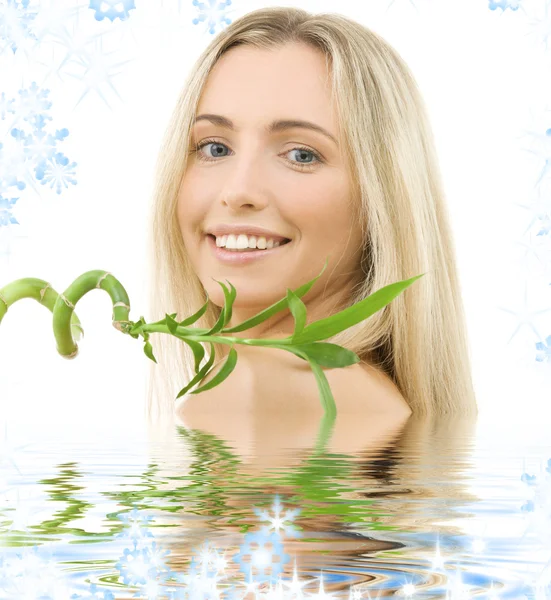 Happy blonde with bamboo — Stock Photo, Image