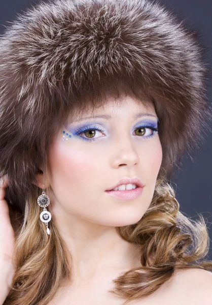 Lovely woman in furry hat — Stock Photo, Image
