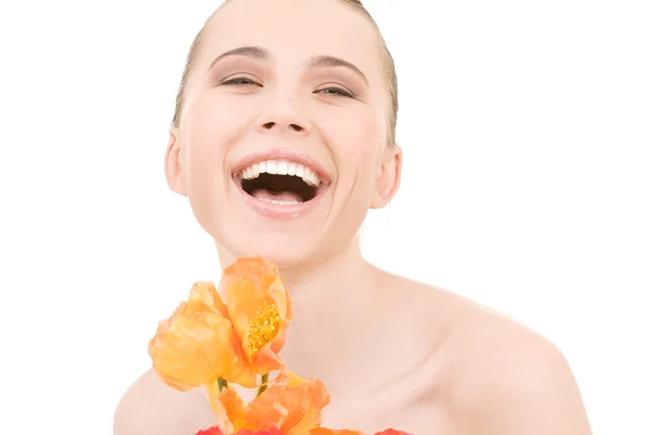 Laughing woman with flowers — Stock Photo, Image