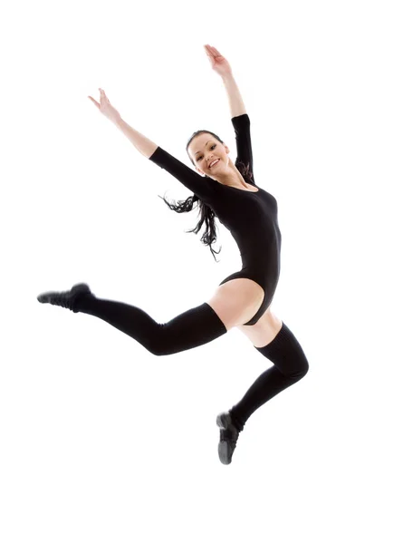 Jeune fille sautante en justaucorps noir — Photo