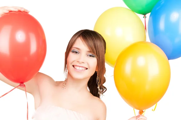 Gelukkig tienermeisje met ballonnen Rechtenvrije Stockafbeeldingen