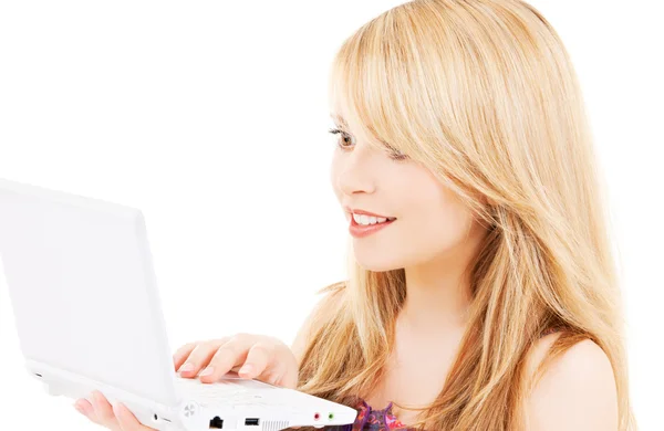 Chica adolescente con ordenador portátil Fotos de stock libres de derechos