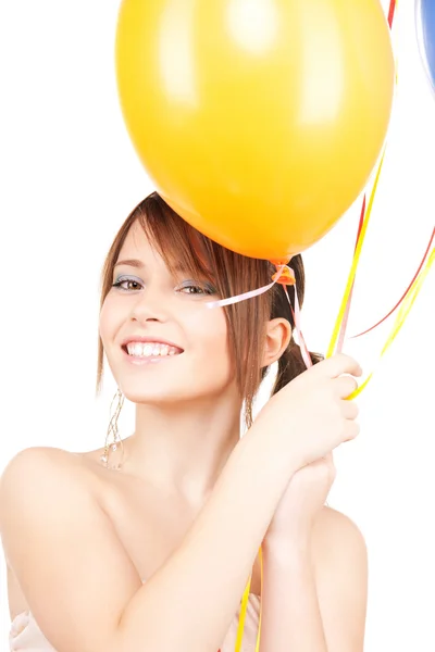 Šťastné dospívající dívka s balónky Stock Obrázky