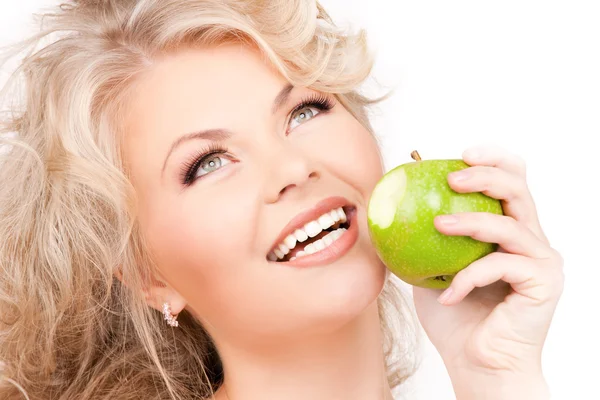 Молода красива жінка з зеленим яблуком Ліцензійні Стокові Фото