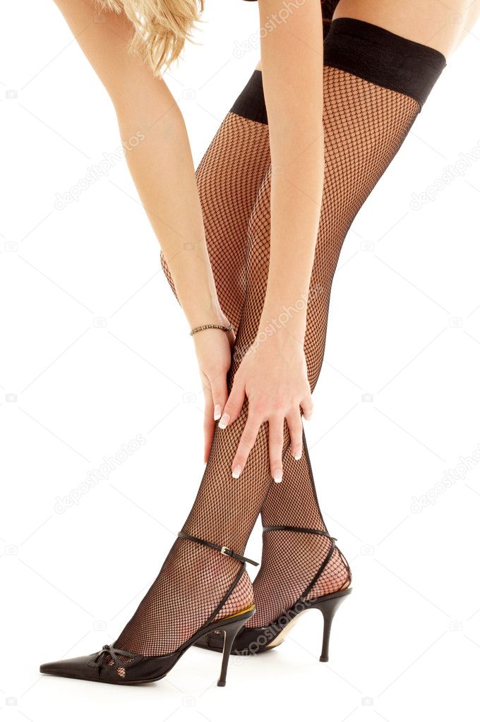 Woman In Stockings And High Heels