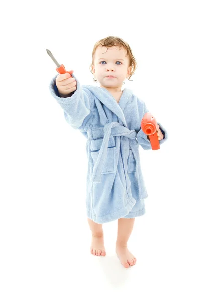 Дитячий хлопчик з іграшковими інструментами — стокове фото