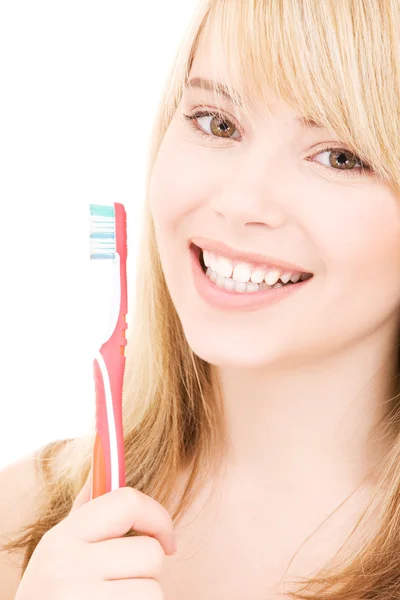 Menina feliz com escova de dentes — Fotografia de Stock